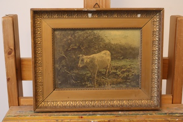Afbeelding van Print van een koe in landschap met lijst