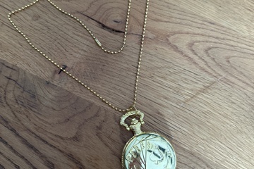 Afbeelding van Goudkleurig zakhorloge met 4 azen NIET GETEST!