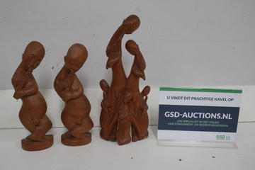 Afbeelding van Houten sculpturen van muzikanten