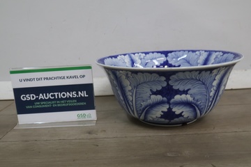 Afbeelding van Blauwe decoratieve keramische schaal met bladmotief