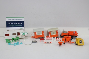 Afbeelding van Playmobil bouwspeelgoed set met caravan en bouwmaterialen