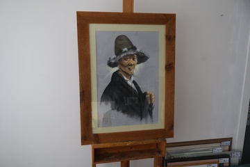 Afbeelding van Ingelijste Schilderij van Oosterse man met hoed