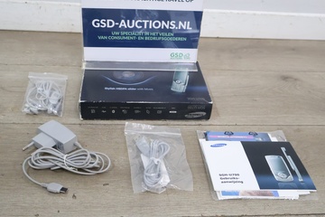 Afbeelding van Samsung SGH-U700 telefoon met accessoires
