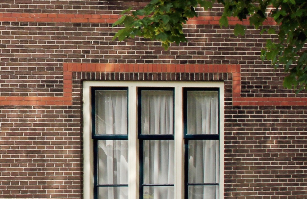 Raampartij met rode baksteen sierbanden Jonkvrouw Brantsenschool - 2016