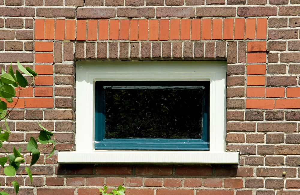 Raam met rode bakstenen sierbanden Jonkvrouw Brantsenschool - 2016