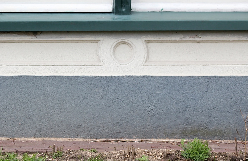 Sierpanelen onder de vensters Notarishuis - 2016