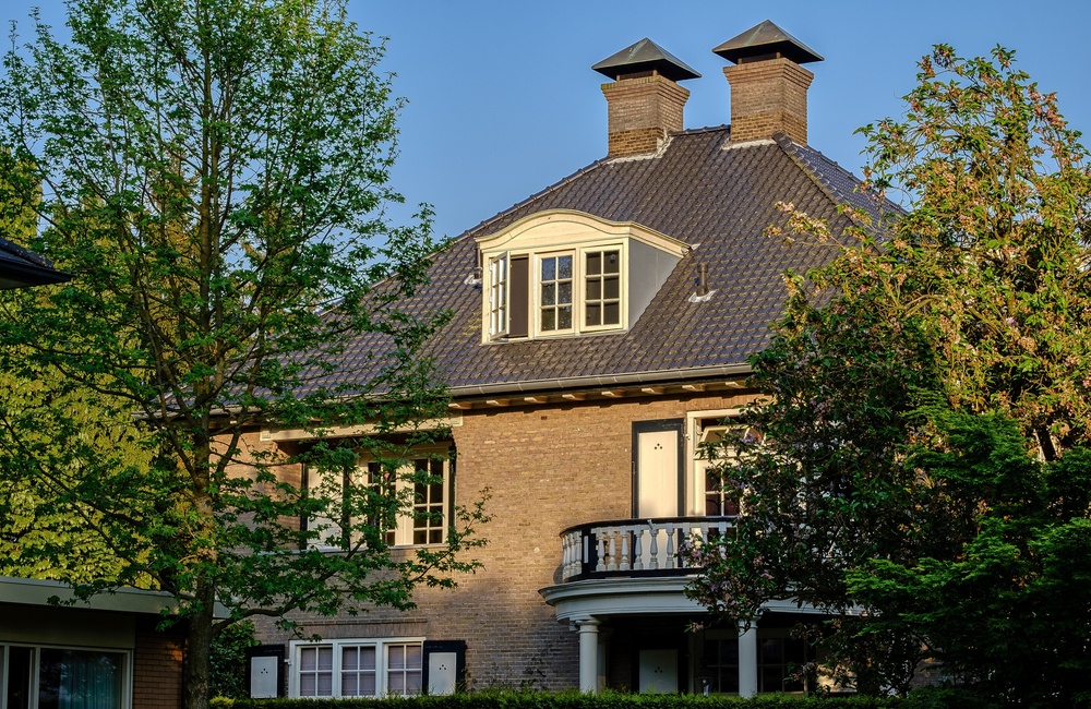Linker zijgevel met halfrond balkon Piepershof - 2016