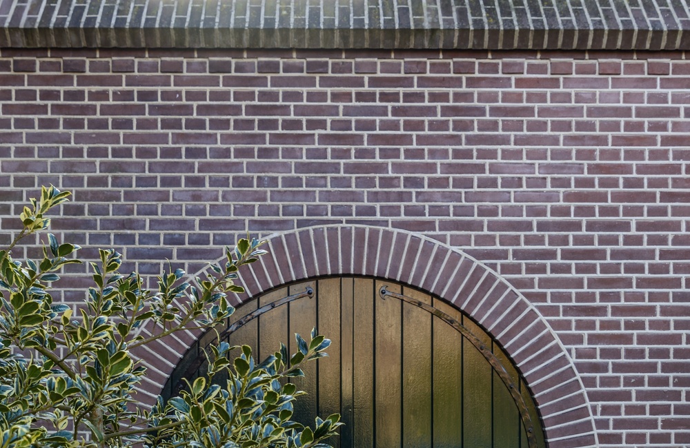 Muur met boogpoort - 2017